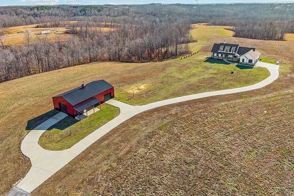 47.3 Acres of Recreational Land with Home for Sale in Indian Mound, Tennessee