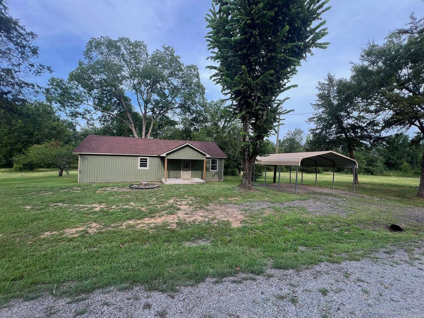 5.25 Acres of Land with Home for Sale in Rover, Arkansas