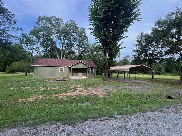 5.25 Acres of Land with Home for Sale in Rover, Arkansas
