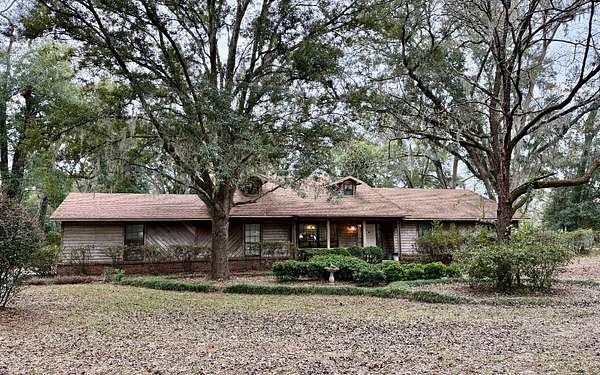 5.57 Acres of Residential Land with Home for Sale in Live Oak, Florida