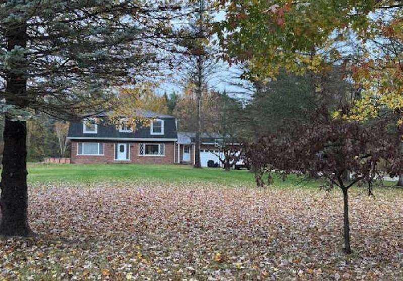 5 Acres of Residential Land with Home for Auction in Burtchville Township, Michigan