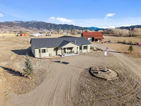 5.6 Acres of Residential Land with Home for Sale in Salida, Colorado