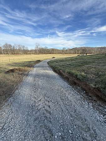 2.2 Acres of Residential Land with Home for Sale in Cumberland City, Tennessee
