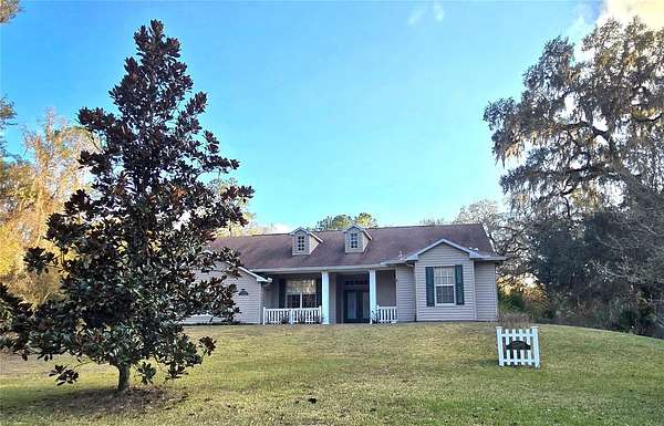 4.6 Acres of Residential Land with Home for Sale in Brooksville, Florida