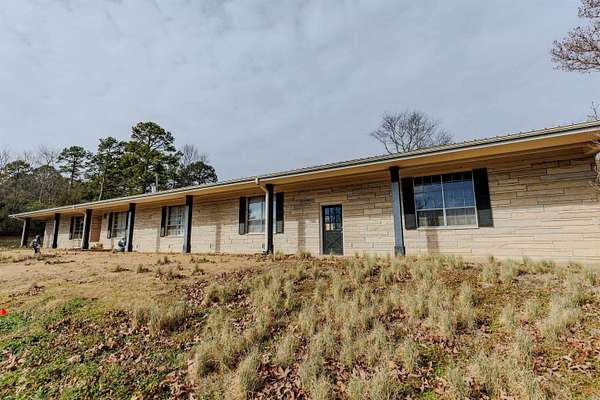 8.59 Acres of Land with Home for Sale in Morrilton, Arkansas