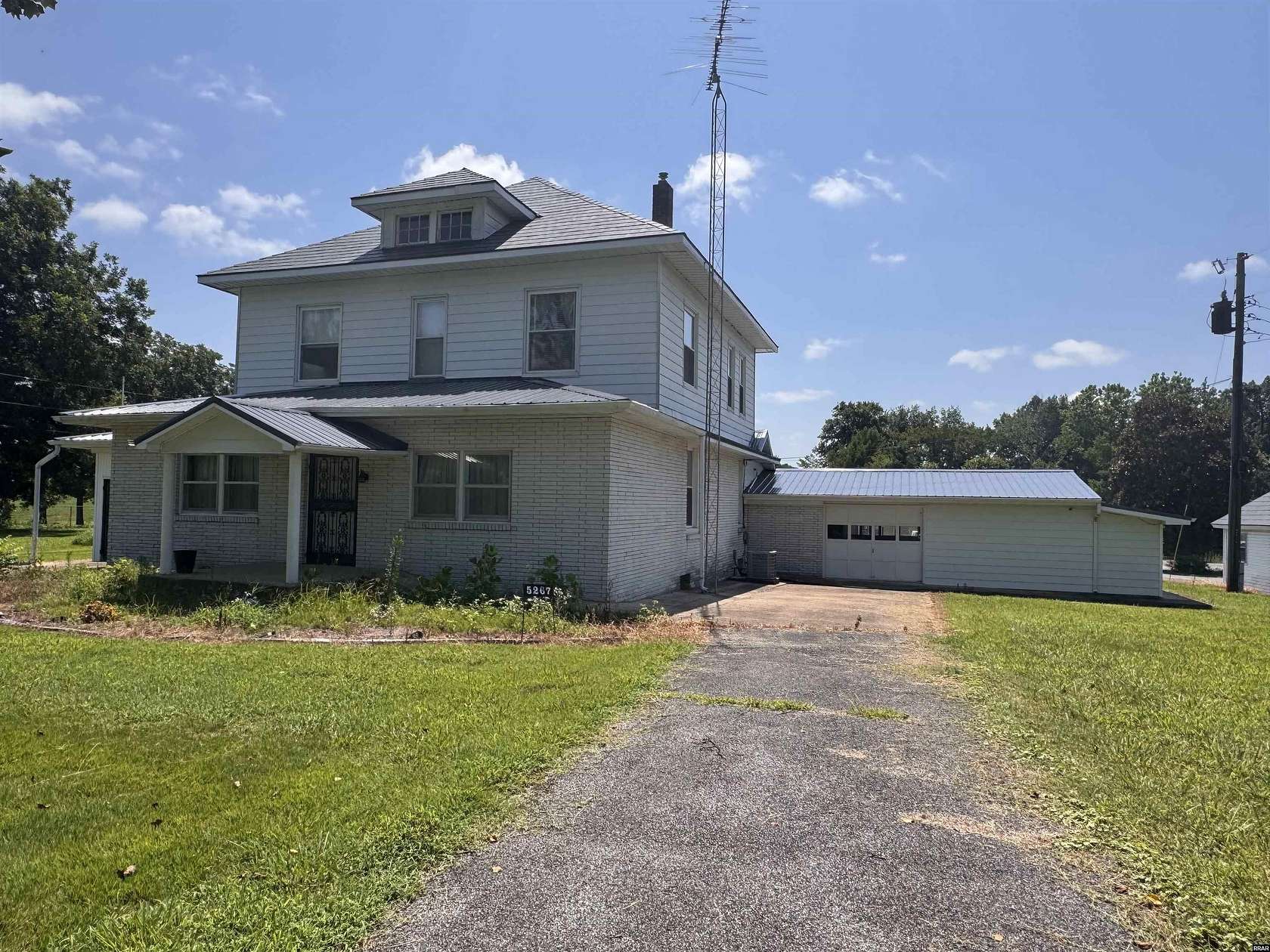 8.34 Acres of Land with Home for Sale in South Fulton, Tennessee