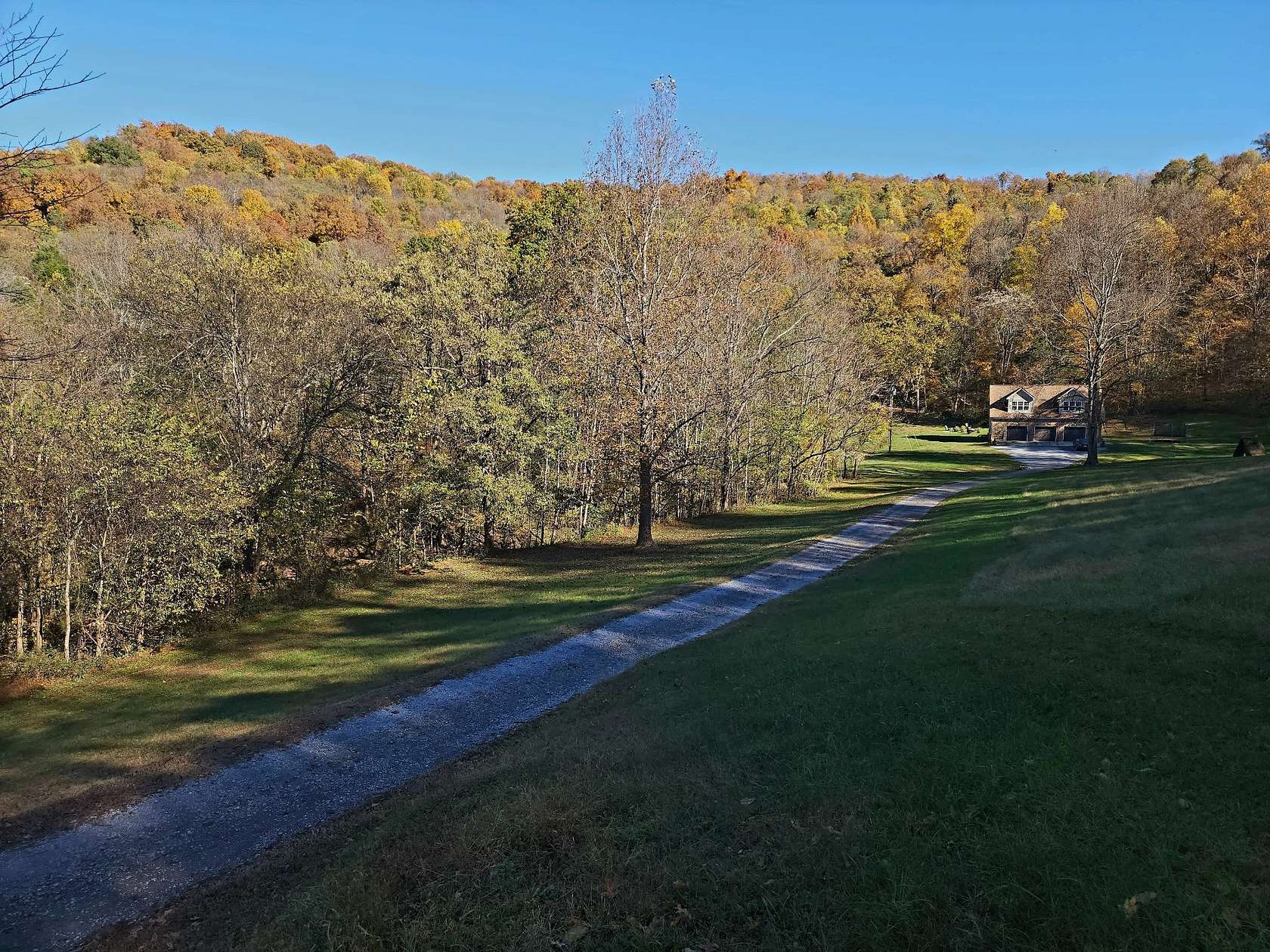 12.1 Acres of Land with Home for Sale in Christiana, Tennessee