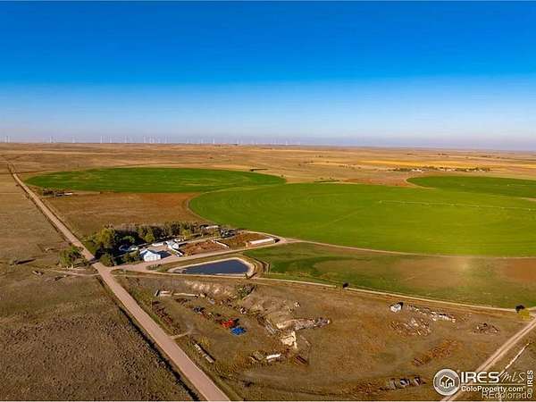 1,759 Acres of Agricultural Land with Home for Sale in Crook, Colorado