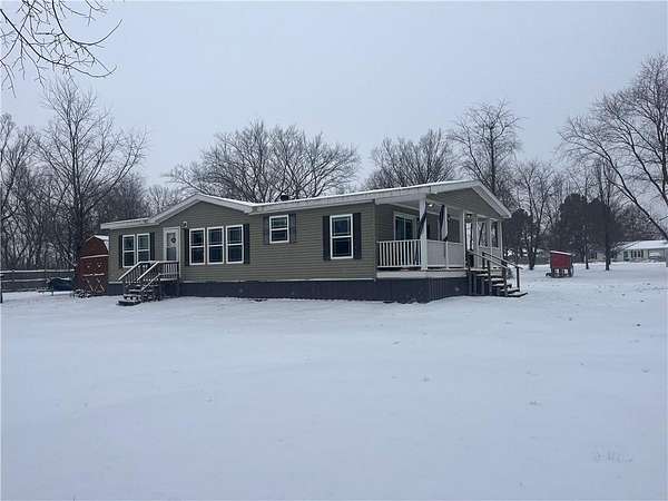 2 Acres of Residential Land with Home for Sale in Gravette, Arkansas