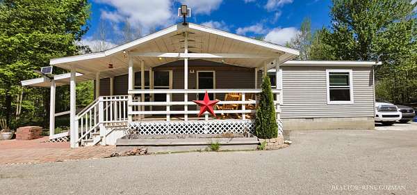 13.3 Acres of Land with Home for Sale in White Cloud, Michigan