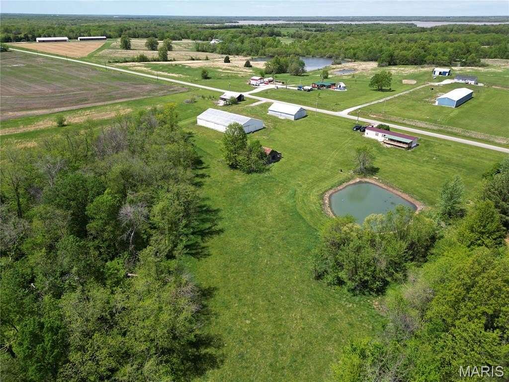 5 Acres of Residential Land with Home for Sale in Perry, Missouri