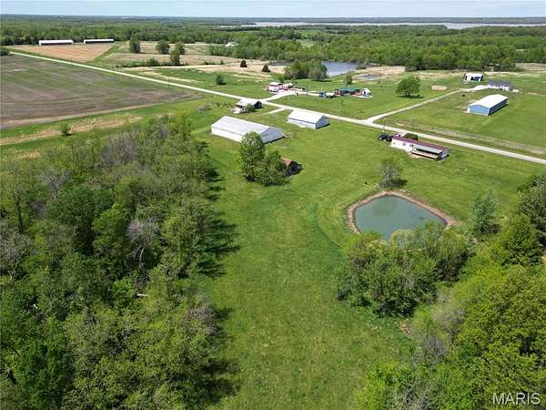 5 Acres of Residential Land with Home for Sale in Perry, Missouri