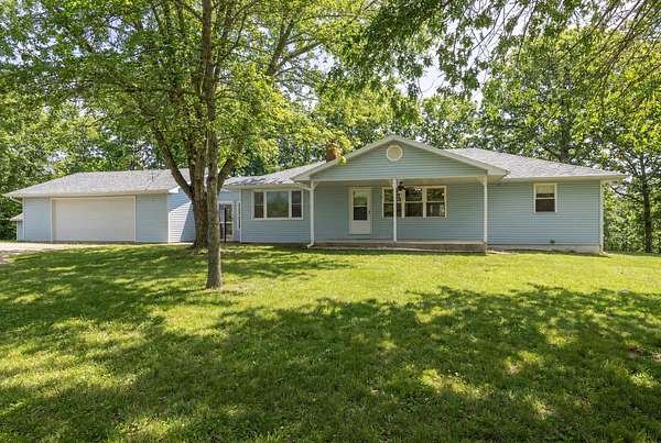 20 Acres of Land with Home for Sale in Hermitage, Missouri