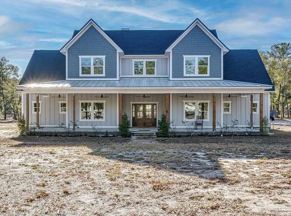 5.5 Acres of Residential Land with Home for Sale in Crawfordville, Florida