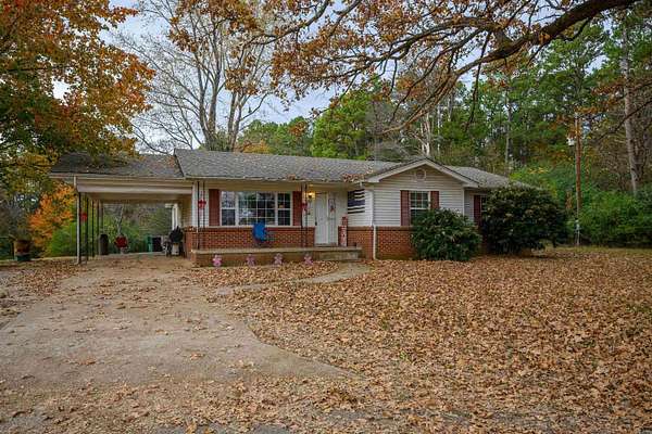 8 Acres of Land with Home for Sale in Evening Shade, Arkansas