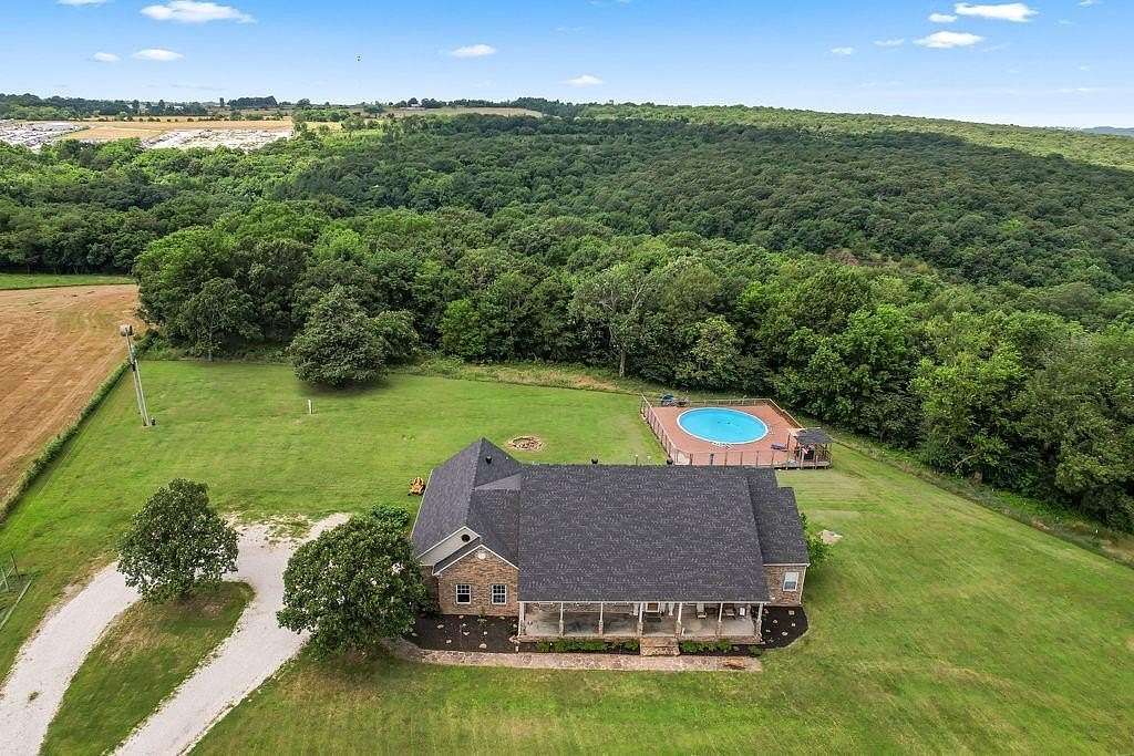 10.4 Acres of Land with Home for Sale in Prairie Grove, Arkansas