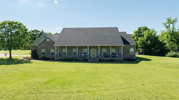 10.4 Acres of Land with Home for Sale in Prairie Grove, Arkansas
