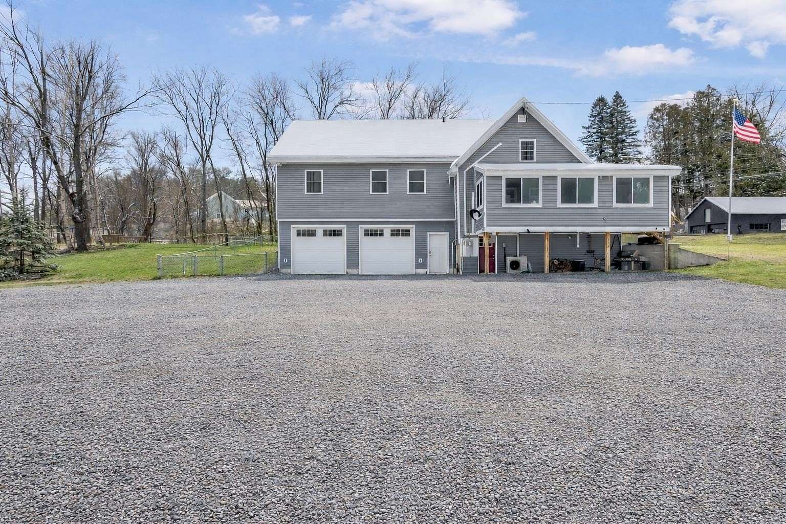 2.5 Acres of Land with Home for Sale in Colebrook, New Hampshire