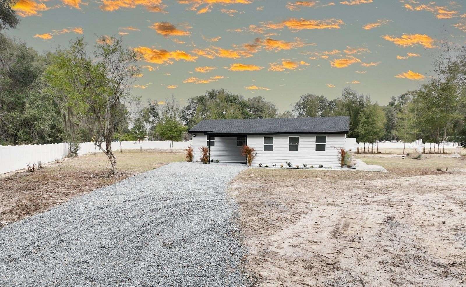6.55 Acres of Land with Home for Sale in Citra, Florida