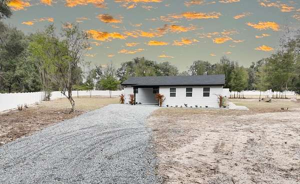 6.55 Acres of Land with Home for Sale in Citra, Florida
