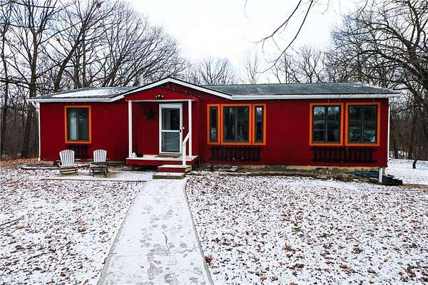 3.79 Acres of Residential Land with Home for Sale in Lathrop, Missouri