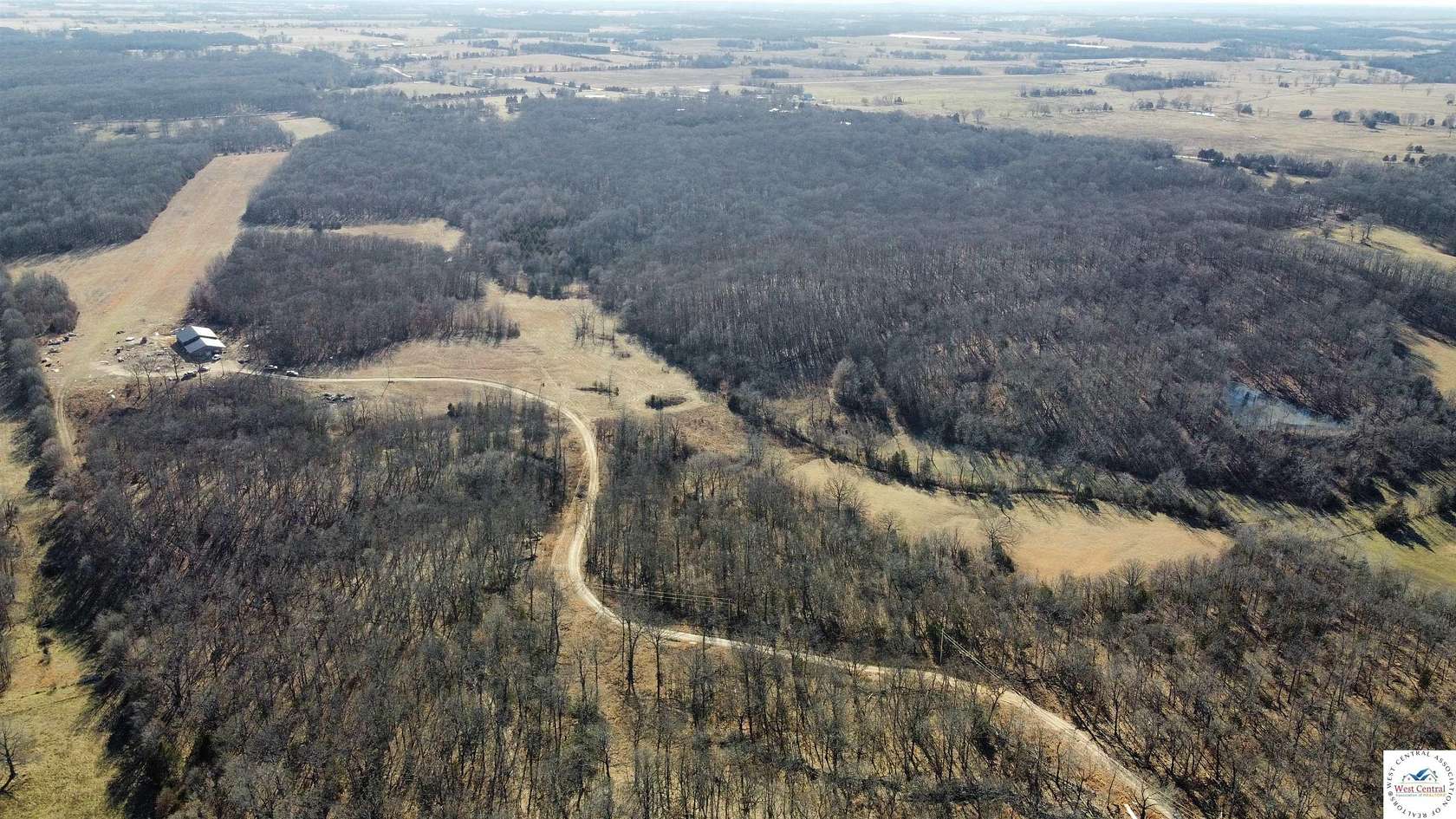 100 Acres of Recreational Land with Home for Sale in Edwards, Missouri