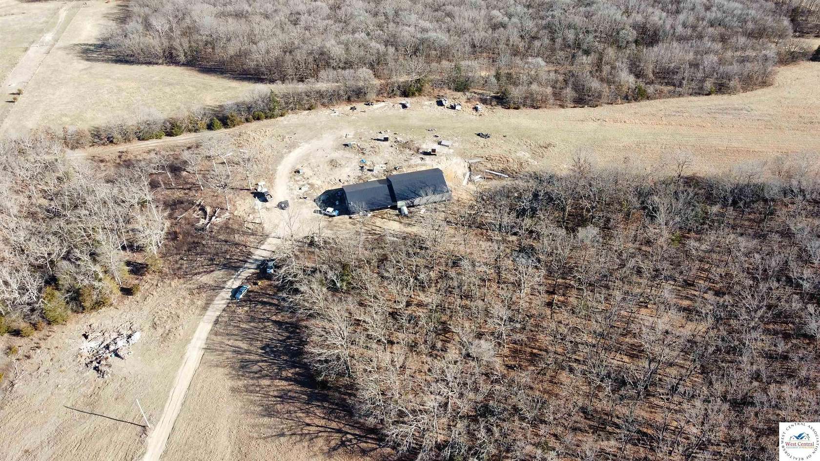 25 Acres of Recreational Land with Home for Sale in Edwards, Missouri