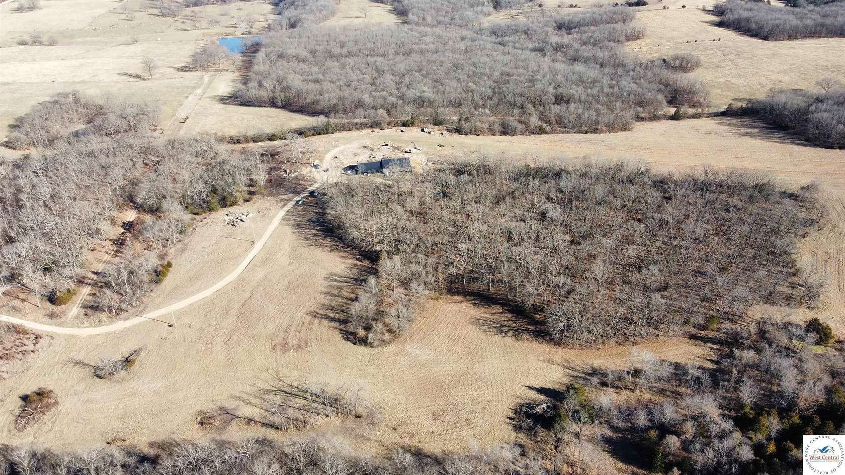 25 Acres of Recreational Land with Home for Sale in Edwards, Missouri