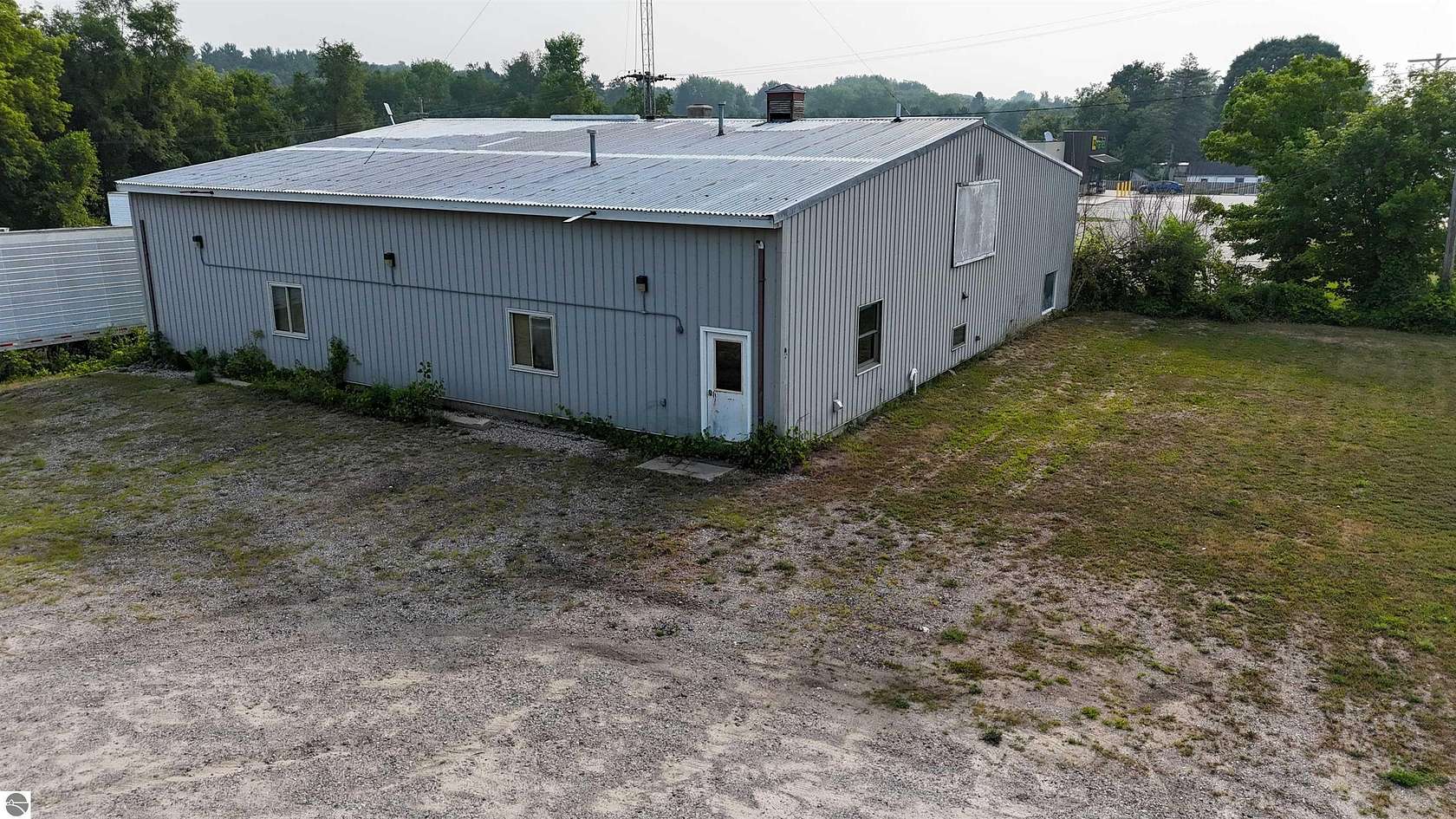 3.88 Acres of Improved Commercial Land for Sale in Edmore, Michigan