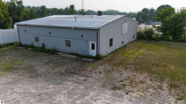 3.88 Acres of Improved Commercial Land for Sale in Edmore, Michigan