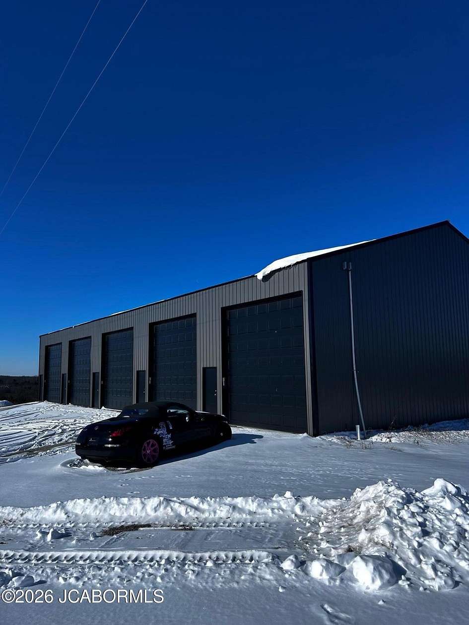 10 Acres of Recreational Land with Home for Sale in Brumley, Missouri