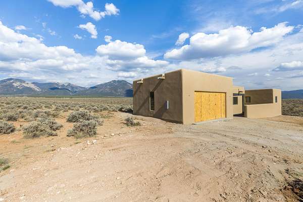 5.47 Acres of Land with Home for Sale in El Prado, New Mexico