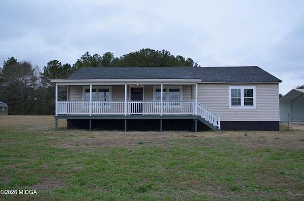 3.6 Acres of Residential Land with Home for Sale in Forsyth, Georgia