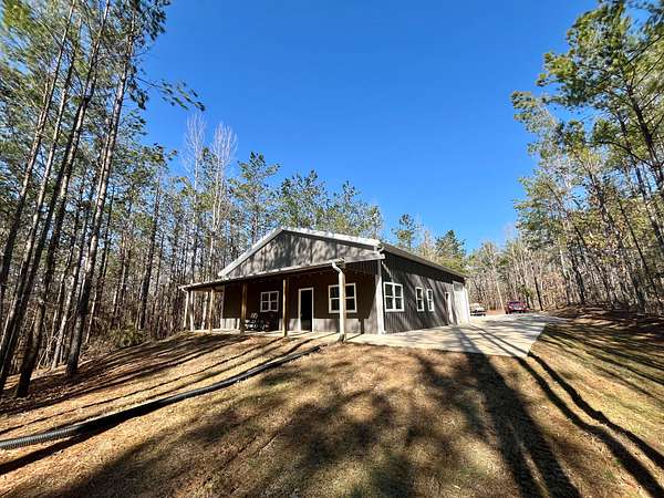 64 Acres of Recreational Land with Home for Sale in Guntown, Mississippi
