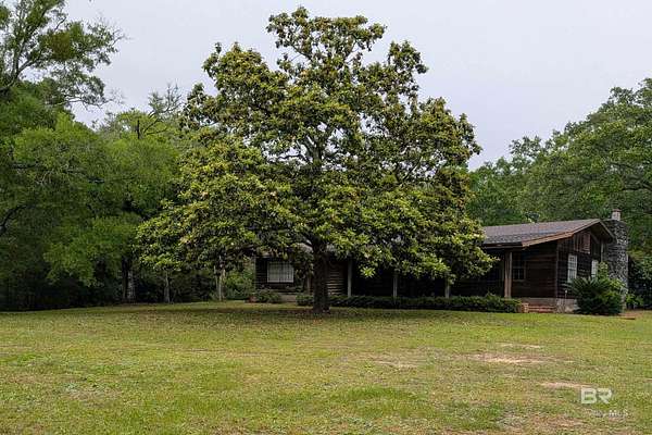 37.2 Acres of Recreational Land with Home for Sale in Lillian, Alabama