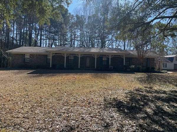 14.1 Acres of Land with Home for Sale in Philadelphia, Mississippi