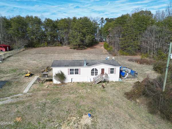 4.5 Acres of Residential Land with Home for Sale in Dandridge, Tennessee