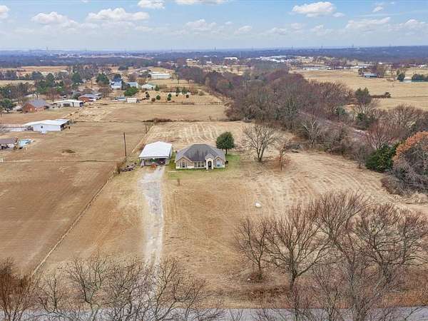 3 Acres of Residential Land with Home for Sale in Decatur, Texas