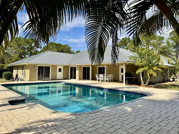 6.79 Acres of Land with Home for Sale in Jupiter, Florida