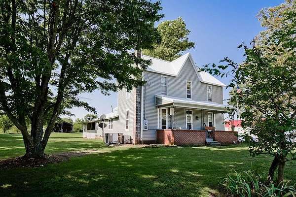 9 Acres of Land with Home for Sale in Madison Township, Missouri