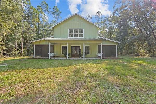 7.39 Acres of Land with Home for Sale in White Oak, Georgia