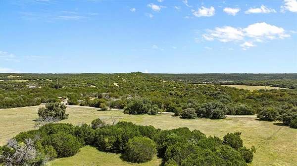 5 Acres of Land with Home for Sale in Glen Rose, Texas