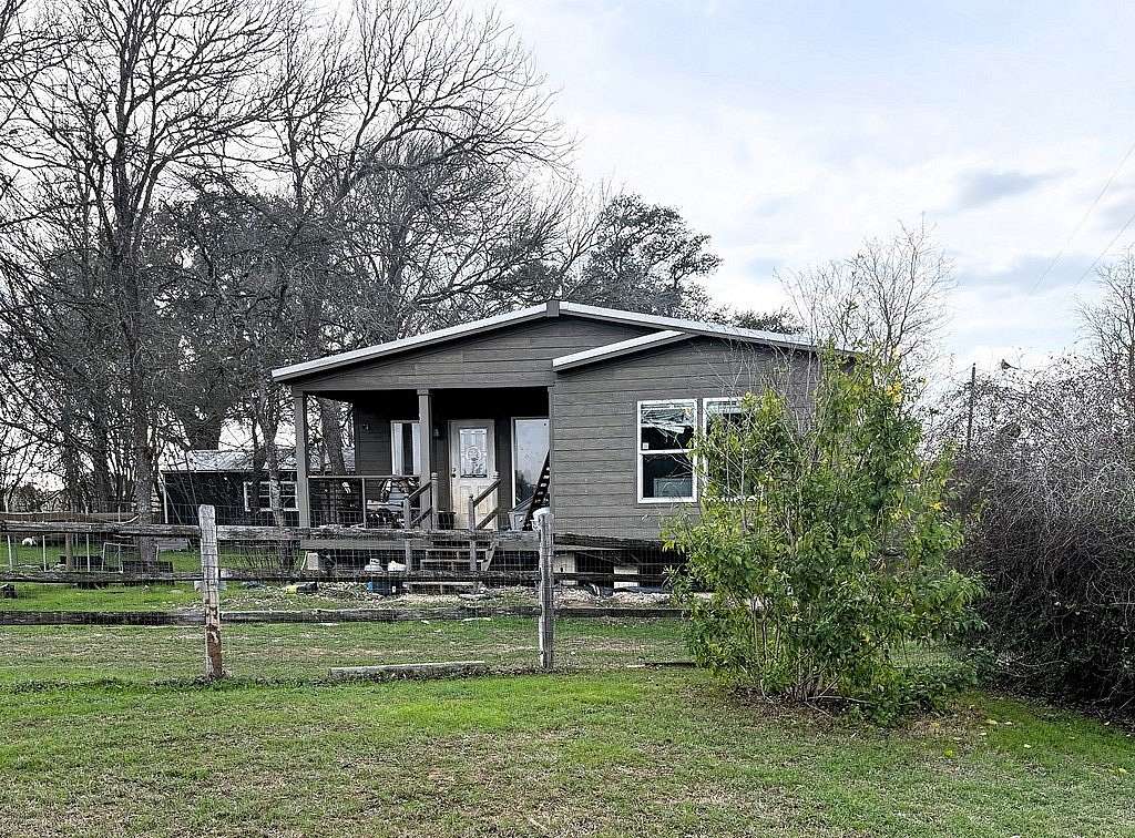 9.64 Acres of Land with Home for Sale in Hallettsville, Texas