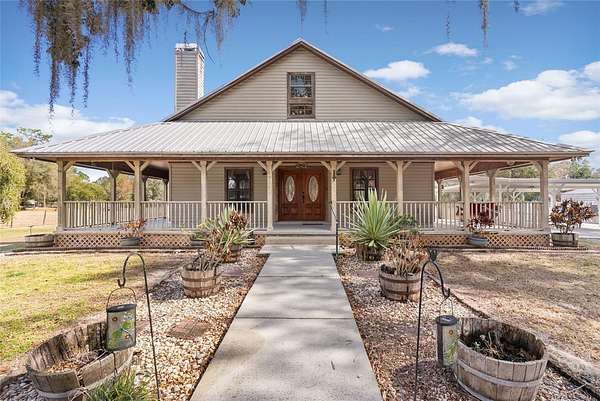 34.2 Acres of Land with Home for Sale in Polk City, Florida