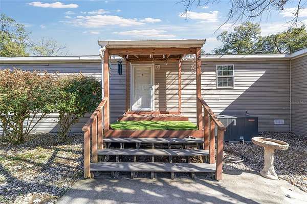 10 Acres of Residential Land with Home for Sale in Lady Lake, Florida