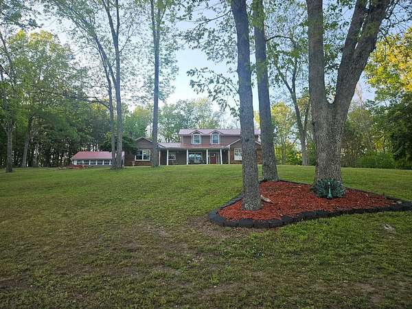 5.48 Acres of Land with Home for Sale in Cumberland City, Tennessee