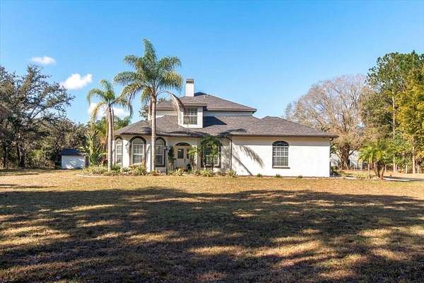 2 Acres of Residential Land with Home for Sale in Land O' Lakes, Florida