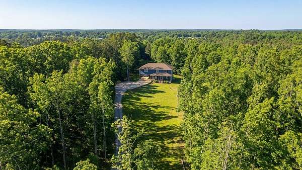 5 Acres of Land with Home for Sale in Savannah, Tennessee