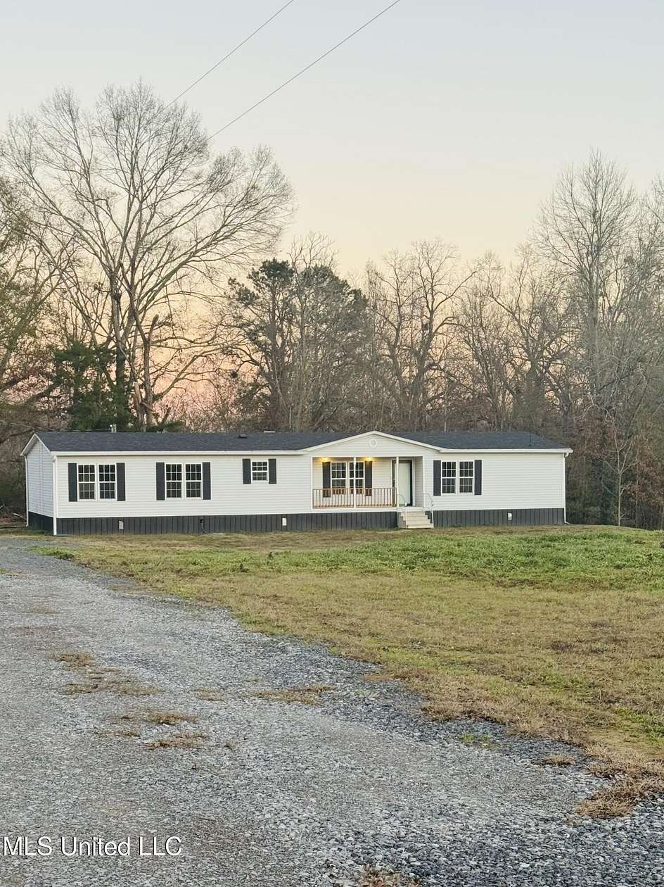 1.13 Acres of Residential Land with Home for Sale in Natchez, Mississippi