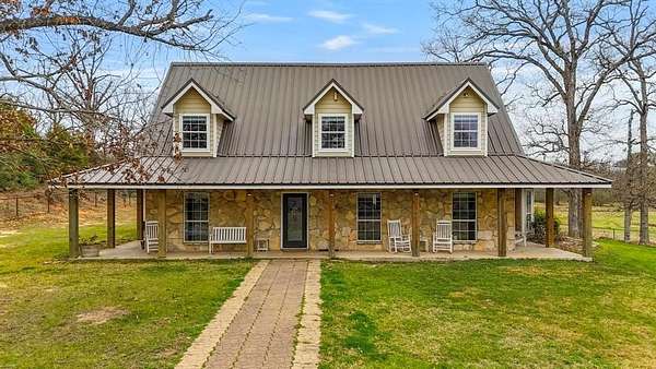 37.4 Acres of Agricultural Land with Home for Sale in Buffalo, Texas